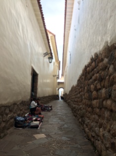 Typical Cusco street, narrow with cobble stones